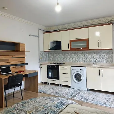 Merkez'de Esyali Studyo Daire Апартаменты *